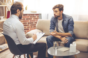 men discussing outpatient alcohol rehab